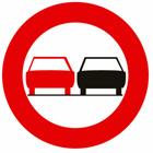 Panneau C35 — A partir de ce signal, jusqu’au prochain carrefour, interdiction de dépasser par la gauche un véhicule attelé ou un véhicule à plus de deux roues